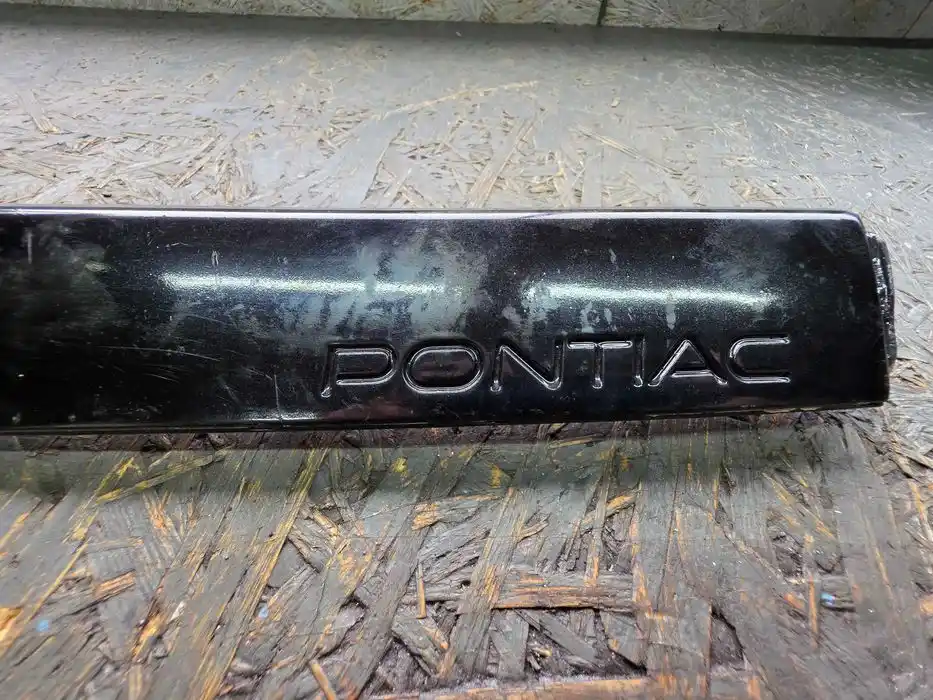 Osłona Lampy Lewej Przód Pontiac Sunbird 90r