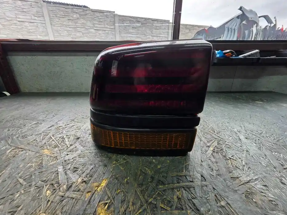 Lampa Lewy Tył Błotnik Pontiac SunBird 165.083.65