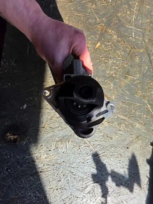 Rozrusznik Opel Corsa D 1.2Benzyna 555.789.21 Przeb.21Tys.Km