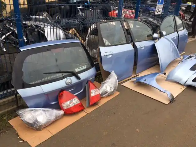 Honda Jazz II 2002- błotnik kod koloru b506m