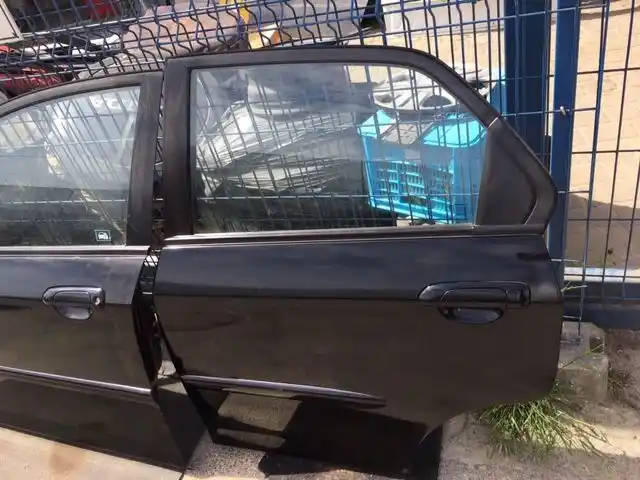 Honda City 2001- Drzwi Lewe TYŁ