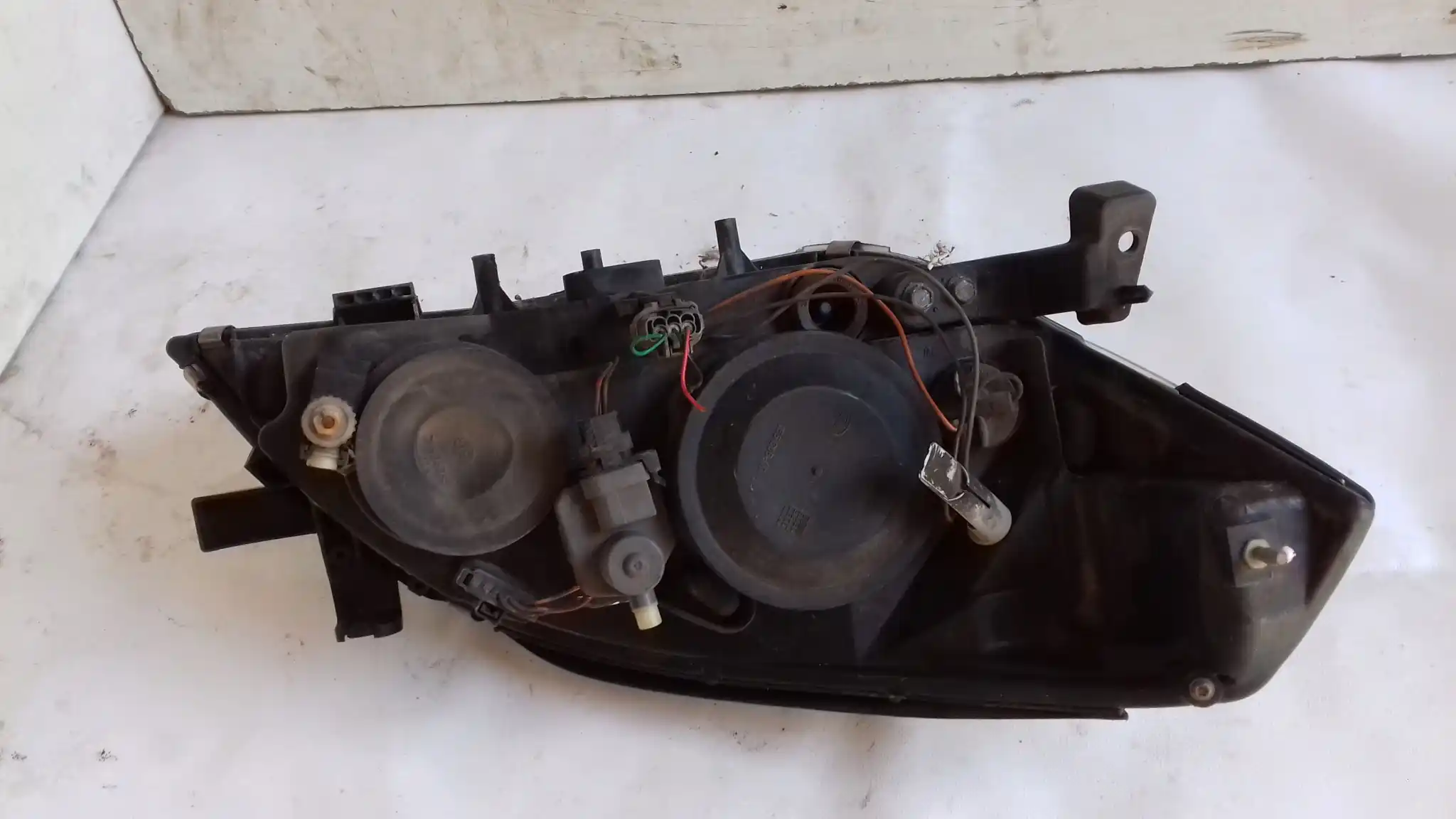 LAMPA LEWY PRZÓD PRZEDNIA 26060AU800 NISSAN PRIMERA P12 02-07