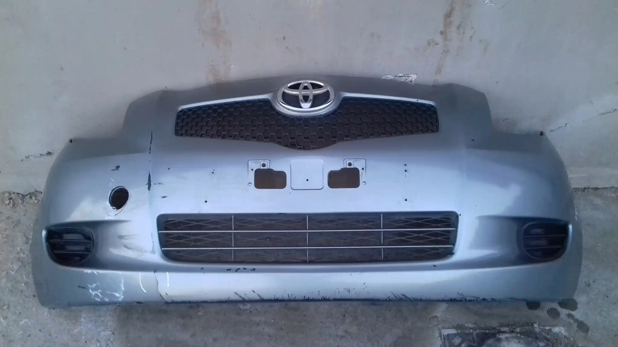 ZDERZAK PRZÓD PRZEDNI TOYOTA YARIS II 05-09 IF8