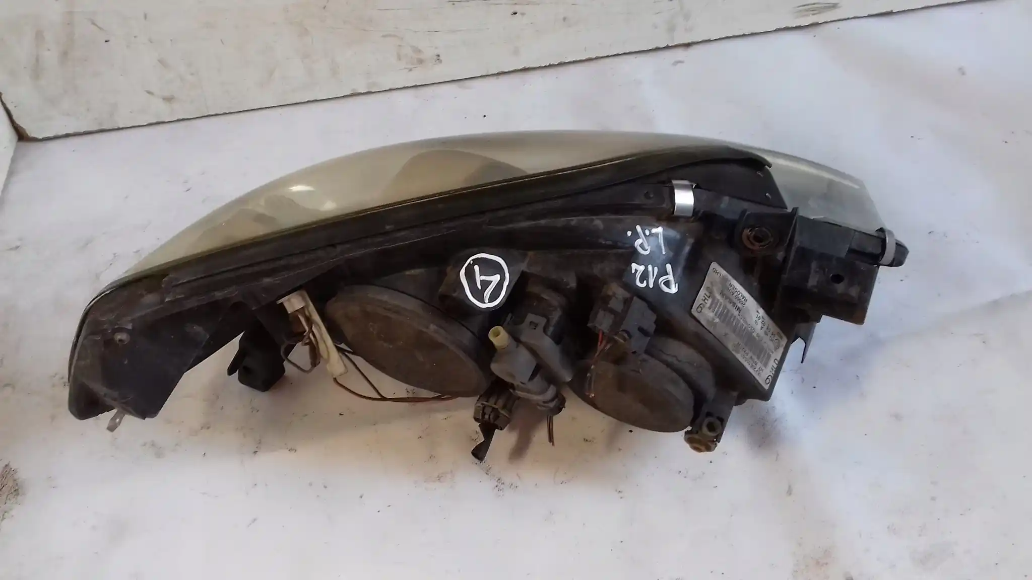 LAMPA LEWY PRZÓD PRZEDNIA 26060AU800 NISSAN PRIMERA P12 02-07