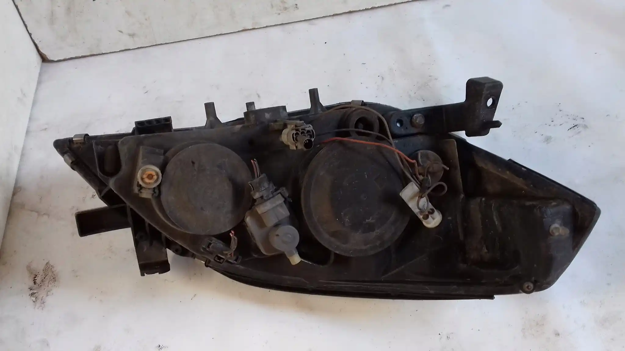 LAMPA LEWY PRZÓD PRZEDNIA 26060AU800 NISSAN PRIMERA P12 02-07