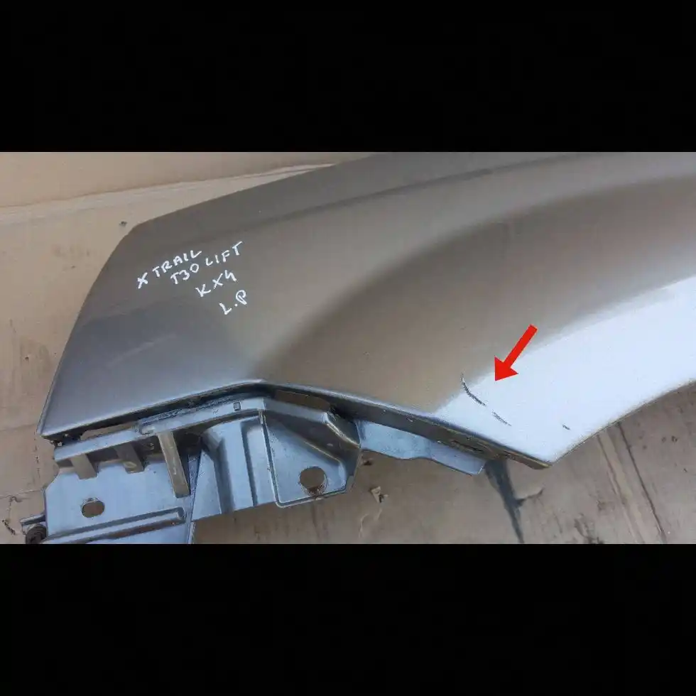 BŁOTNIK LEWY PRZÓD PRZEDNI 631138H700 NISSAN X TRAIL T30 01-07 KX4