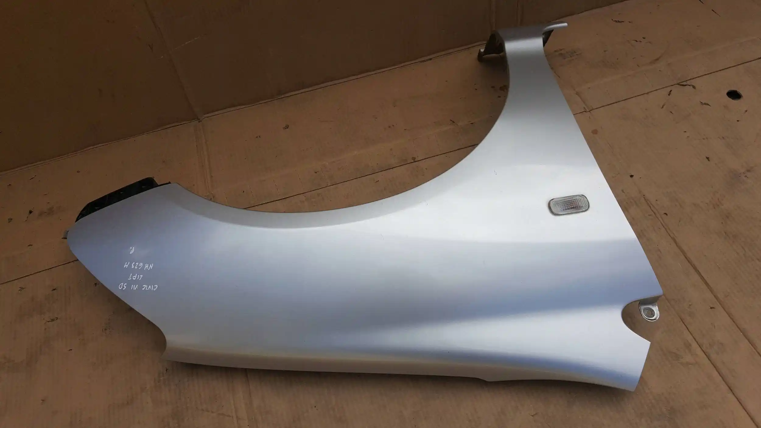 BŁOTNIK PRAWY PRZÓD PRZEDNI HONDA CIVIC VII LIFT 04-06 NH623M