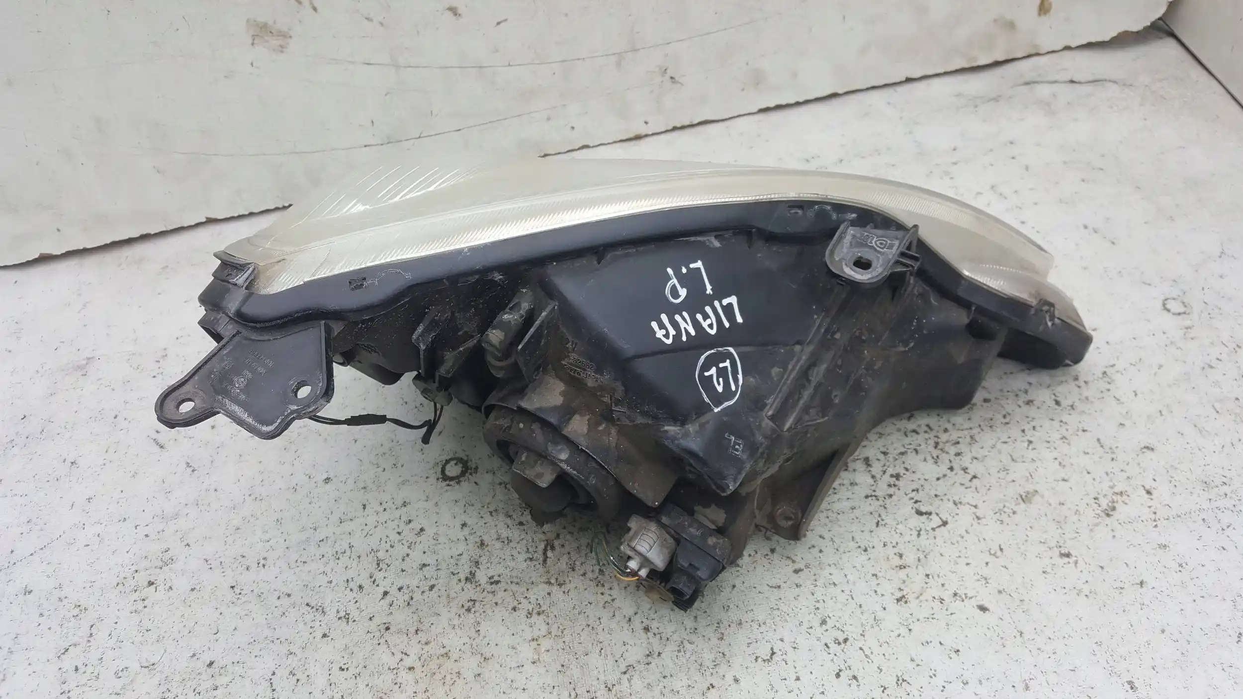 LAMPA LEWY PRZÓD PRZEDNIA 10032662 SUZUKI LIANA 01-