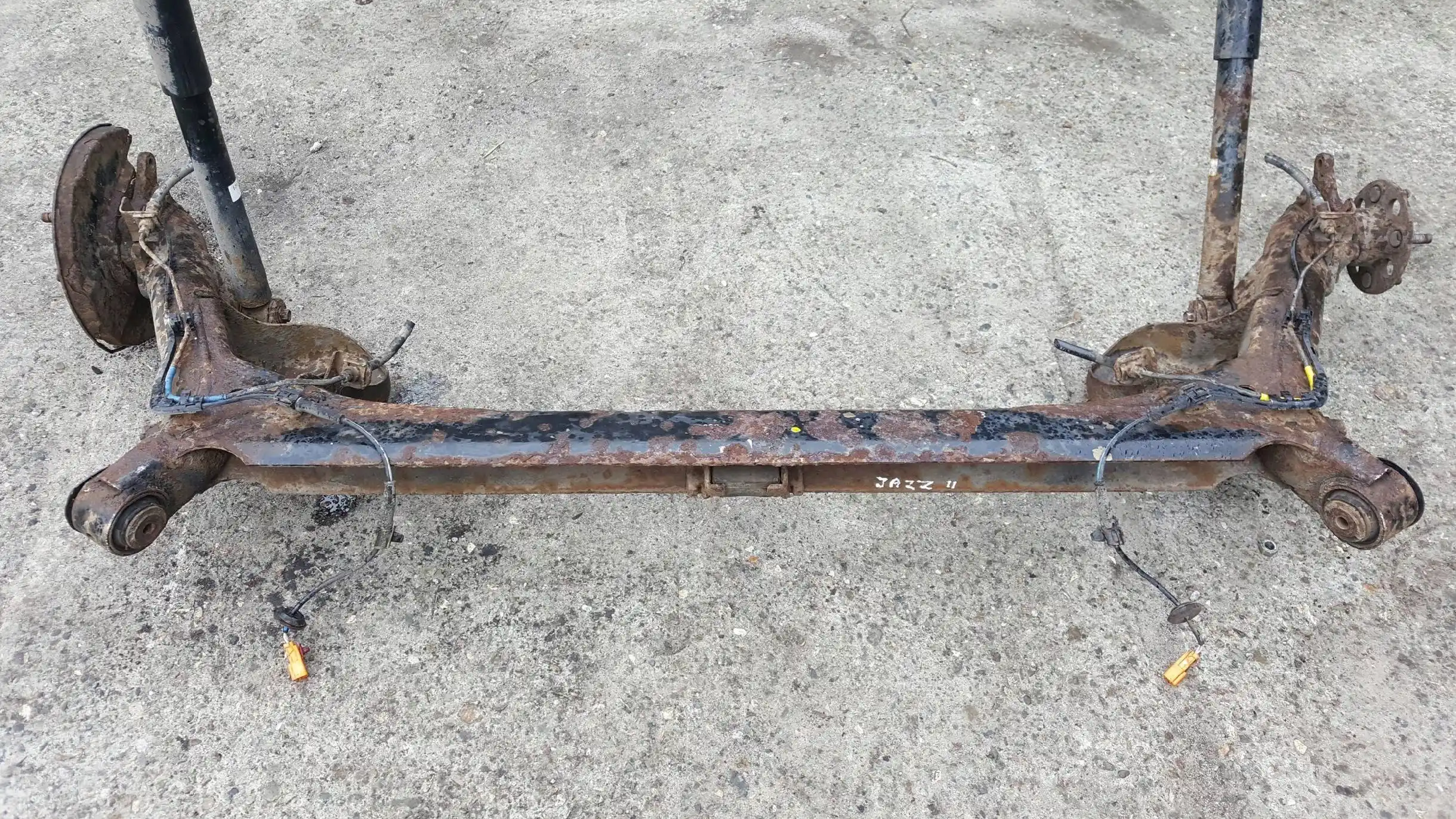 SANKI BELKA ZAWIESZENIA OŚ TYŁ TYLNA TARCZE ABS HONDA JAZZ B 5D 02-08