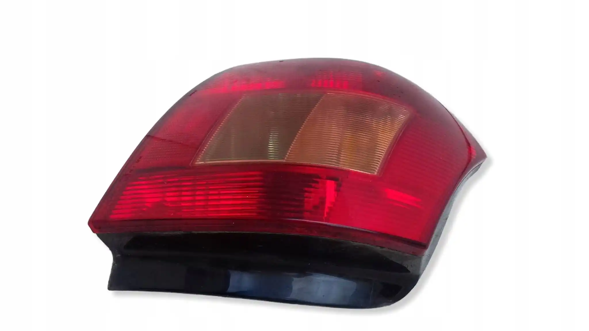 LAMPA LEWY TYŁ TYLNA TOYOTA COROLLA E12 HB 01-04