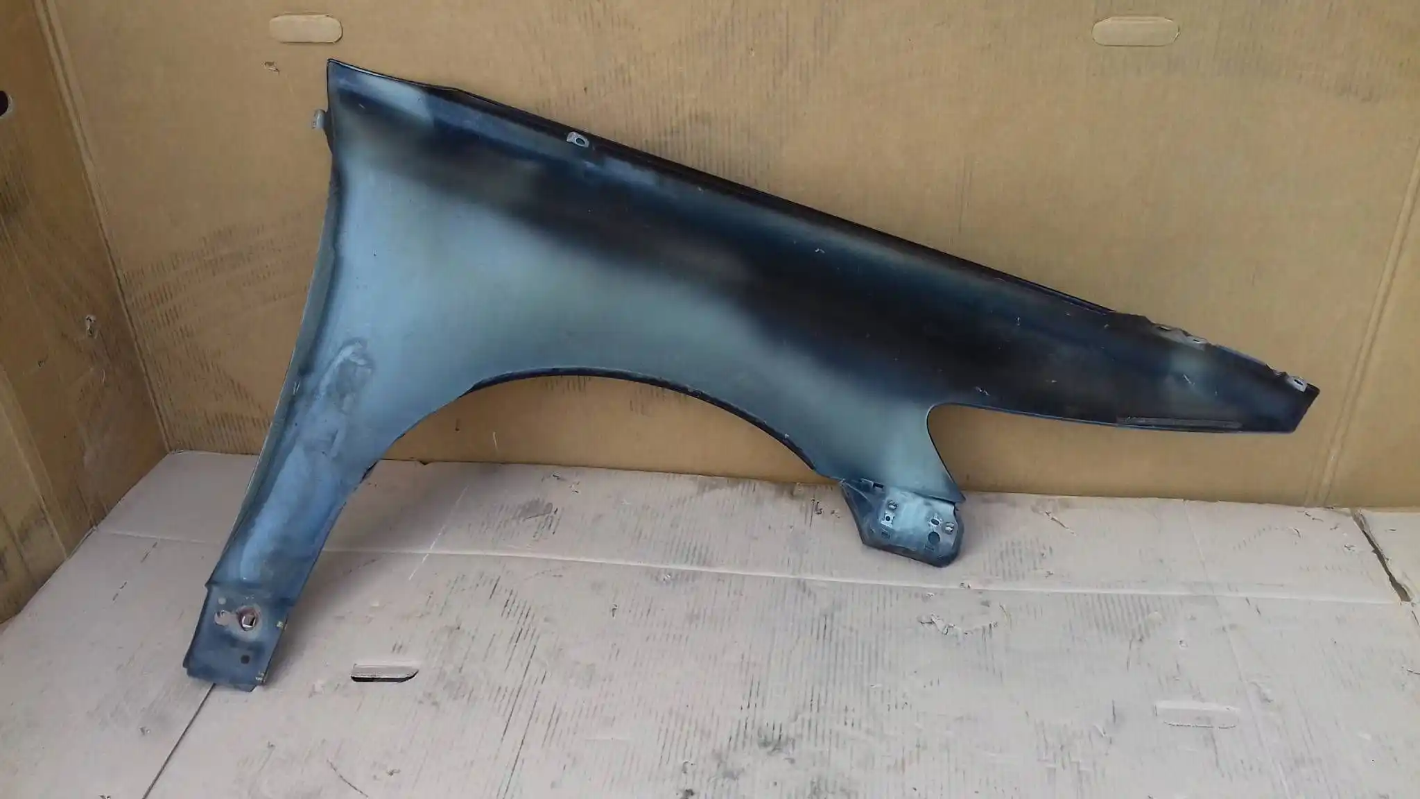 BŁOTNIK LEWY PRZÓD PRZEDNI VOLVO S40 II V50 04-07 LAK 019-26