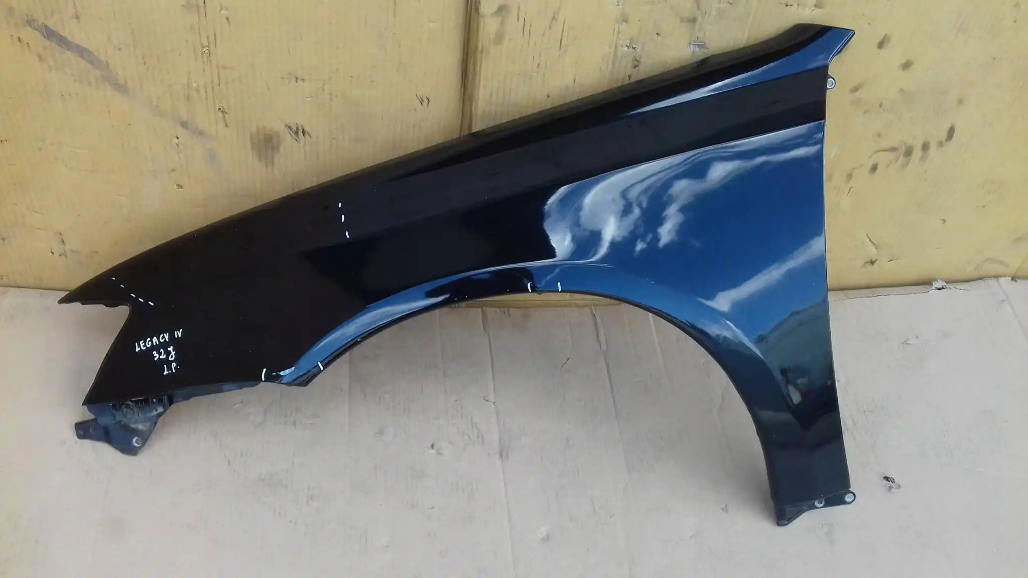 BŁOTNIK LEWY PRZÓD PRZEDNI SUBARU LEGACY IV LIFT 06-09 32J