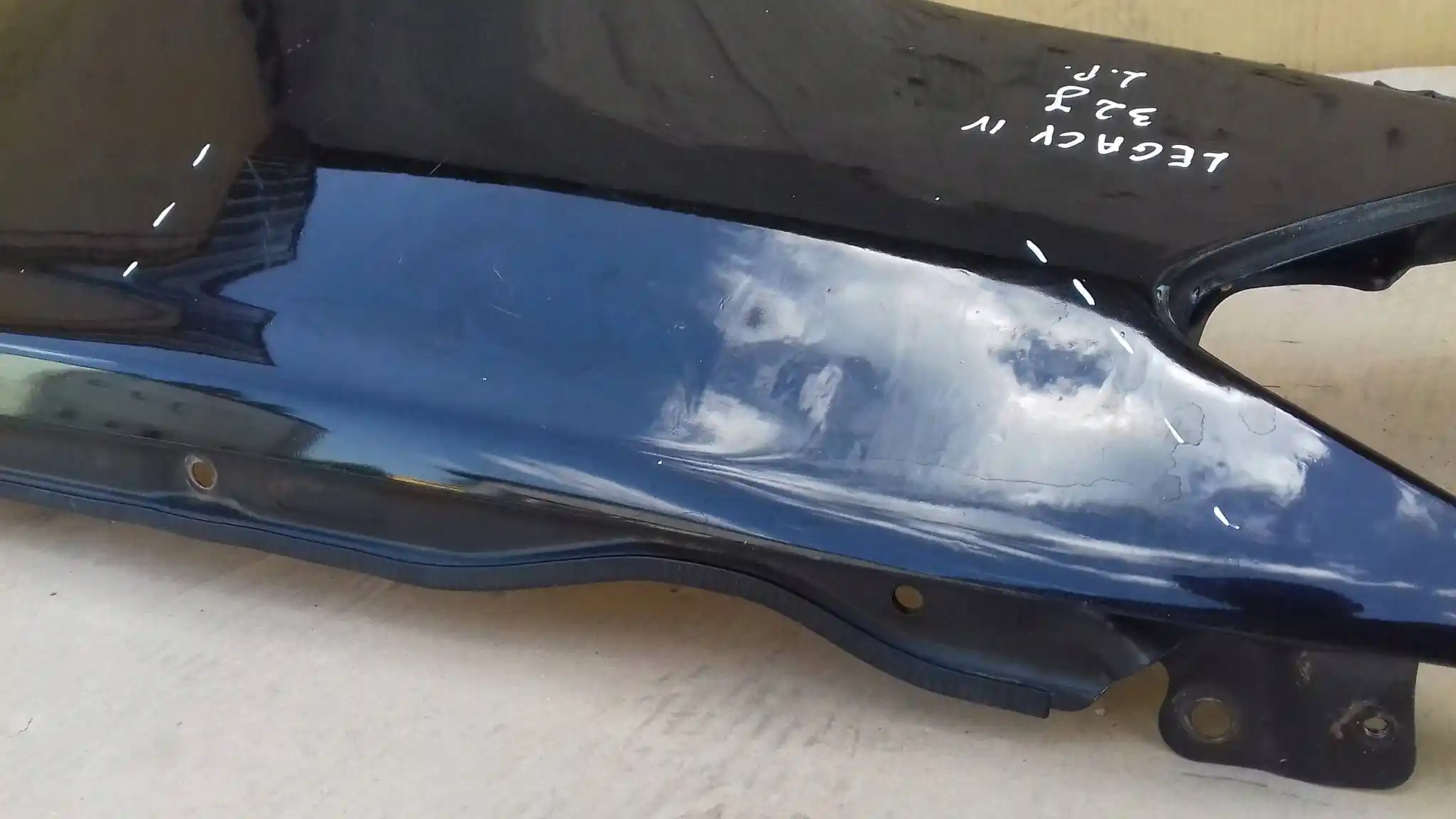 BŁOTNIK LEWY PRZÓD PRZEDNI SUBARU LEGACY IV LIFT 06-09 32J