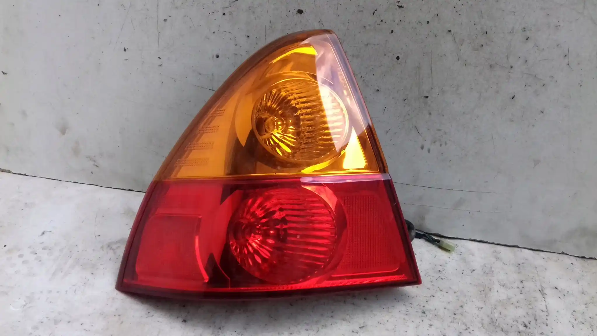 LAMPA LEWY TYŁ TYLNA SUZUKI LIANA SEDAN 01-